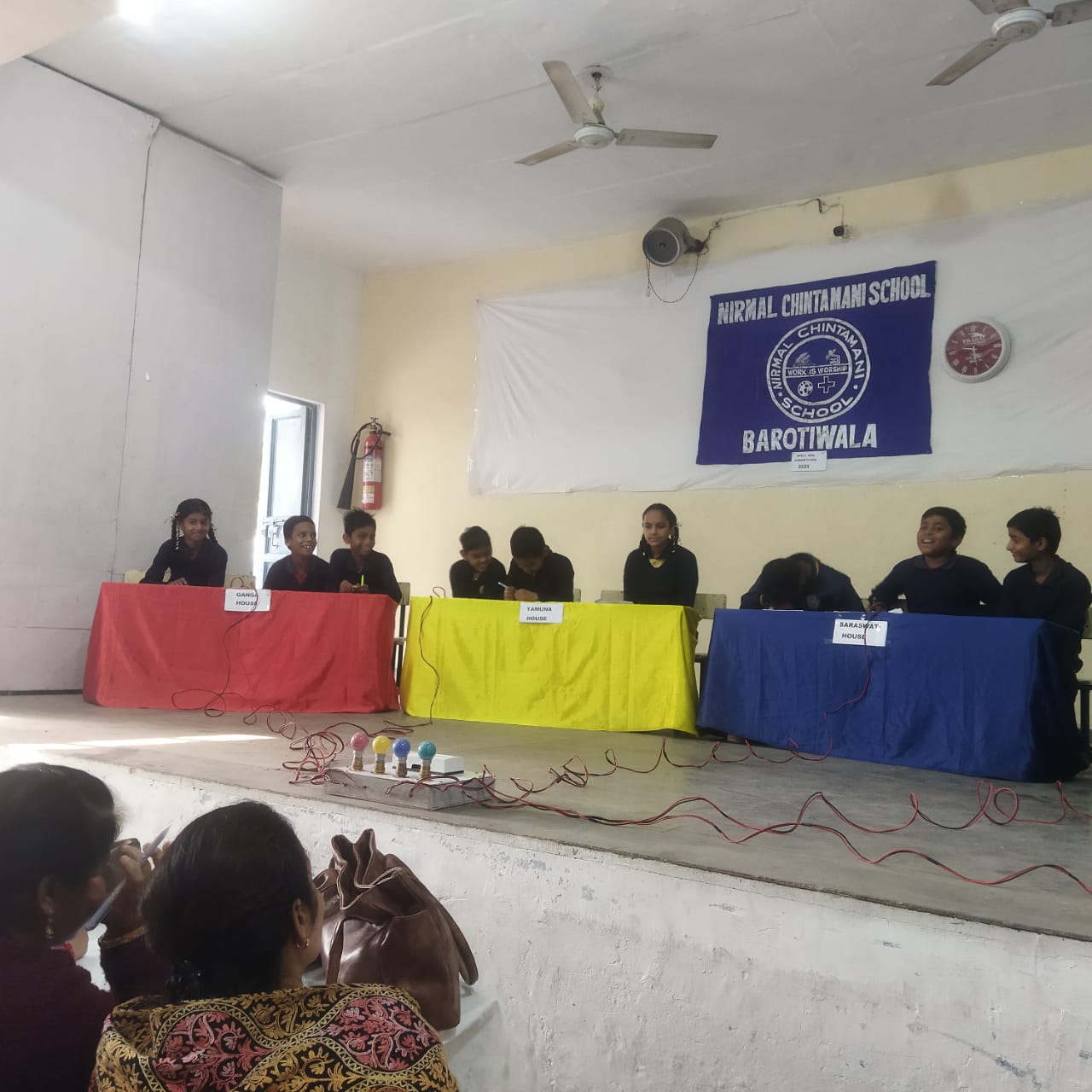 Team discussion during quiz